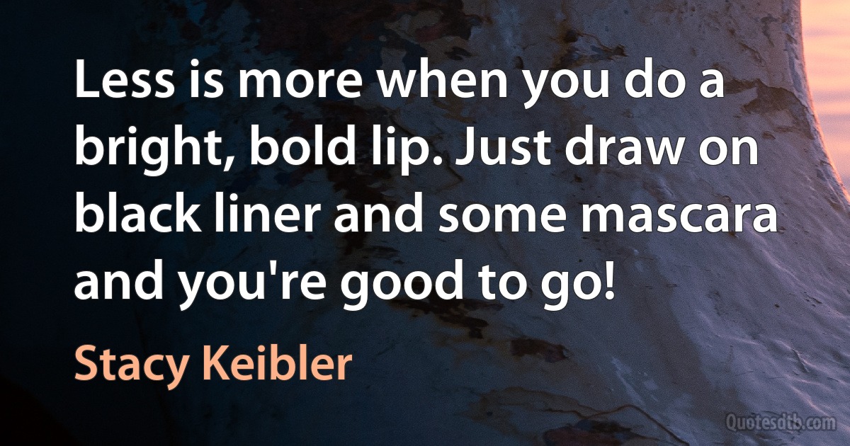 Less is more when you do a bright, bold lip. Just draw on black liner and some mascara and you're good to go! (Stacy Keibler)